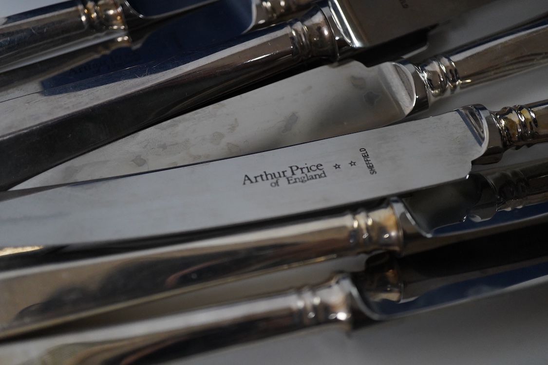 A set of twelve recent Arthur Price of Sheffield, silver plated handled steel table knives, 24cm and twelve matching dessert knives, 21.4cm.